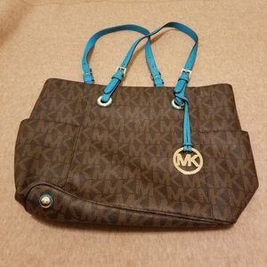 Brown Michael Kors jet set with teal handles